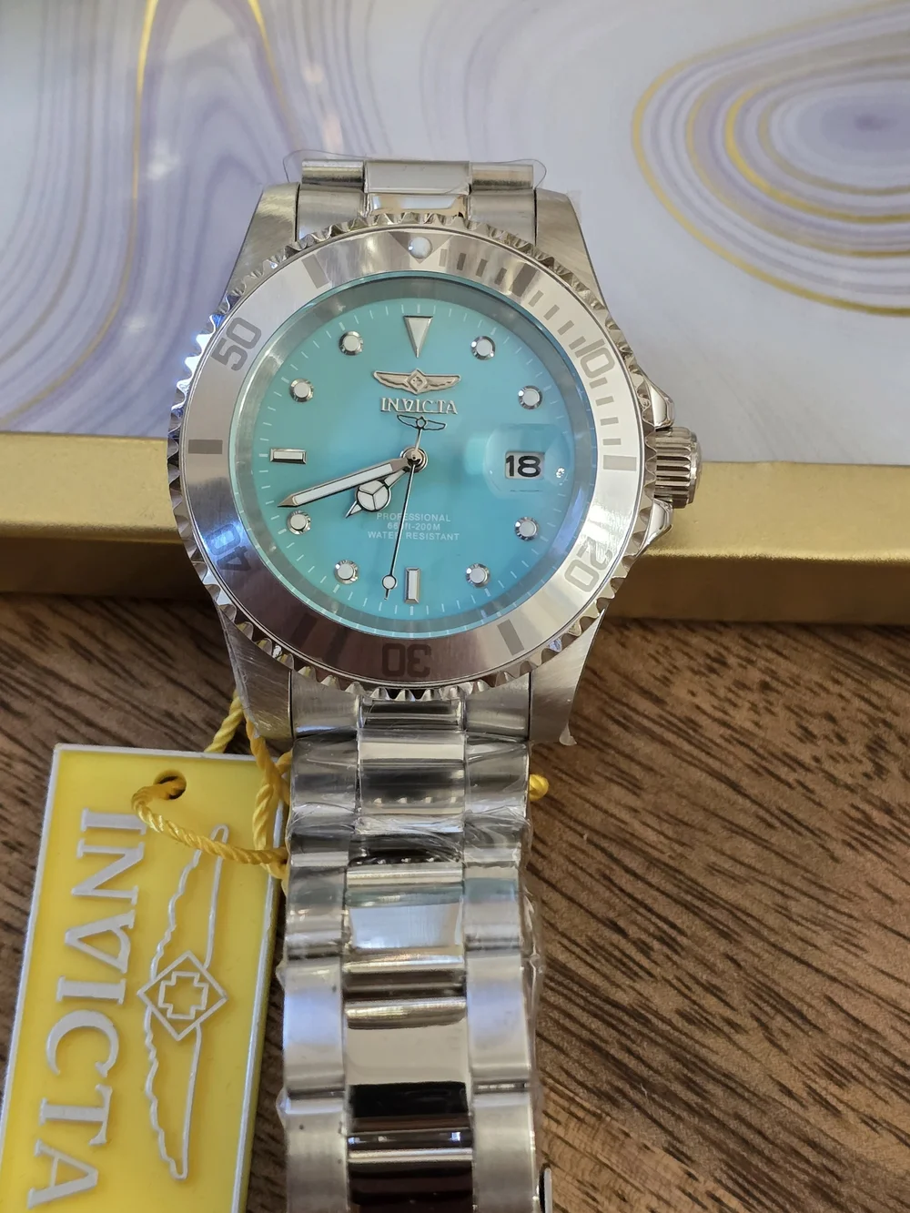 Invicta Men’s Professional Turquoise Dial Stainless Steel Dive Watch